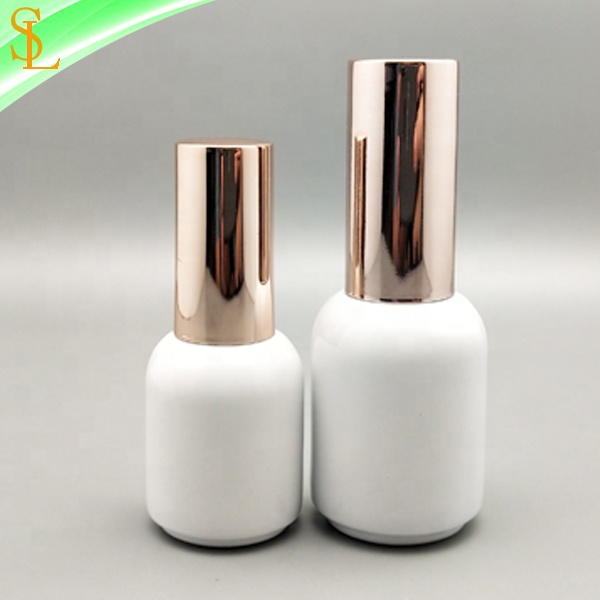 fancy custom round glossy white empty uv gel nail polish bottles 10ml 15ml with rose gold round caps and flat gel brush