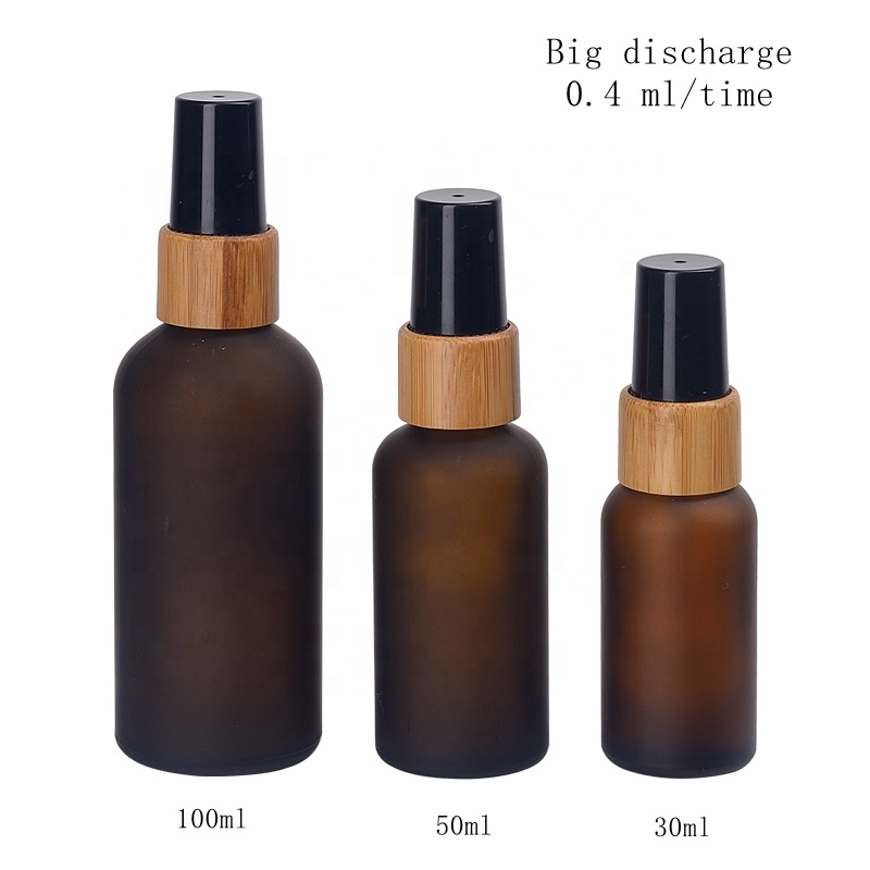 frosted amber glass bottles 30 ml 50 ml 100 ml with 18/415 bamboo wooden mist spray black plastic oil sprayer for hair oil