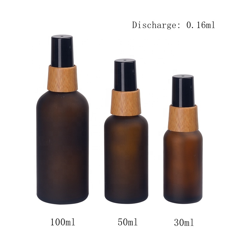 frosted amber glass bottles 30 ml 50 ml 100 ml with 18/415 bamboo wooden mist spray black plastic oil sprayer for hair oil
