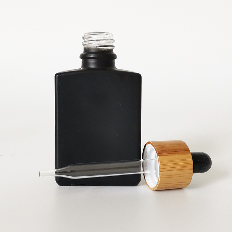 frosted black essential oil bottels 30ml matt black rectangle glass dropper bottle with bamboo cap lid