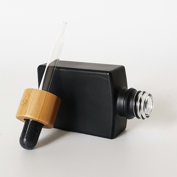frosted black essential oil bottels 30ml matt black rectangle glass dropper bottle with bamboo cap lid