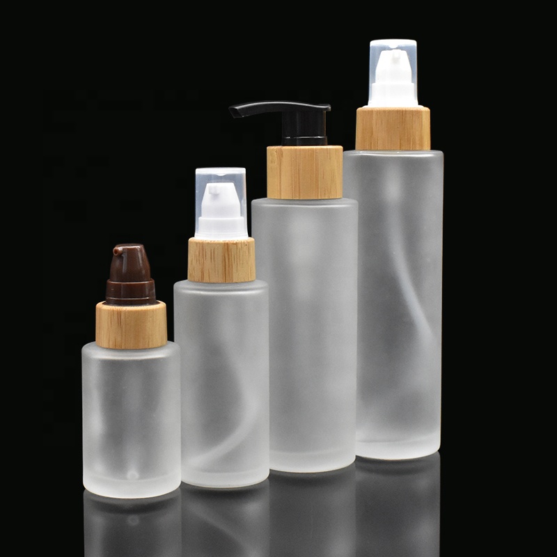 frosted glass bottles 30ml 50ml flat shoulder glass bottles 100ml 120ml with bamboo pump cap for lotion shampoo