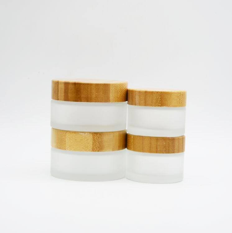 glass cosmetic cream jar with bamboo lid