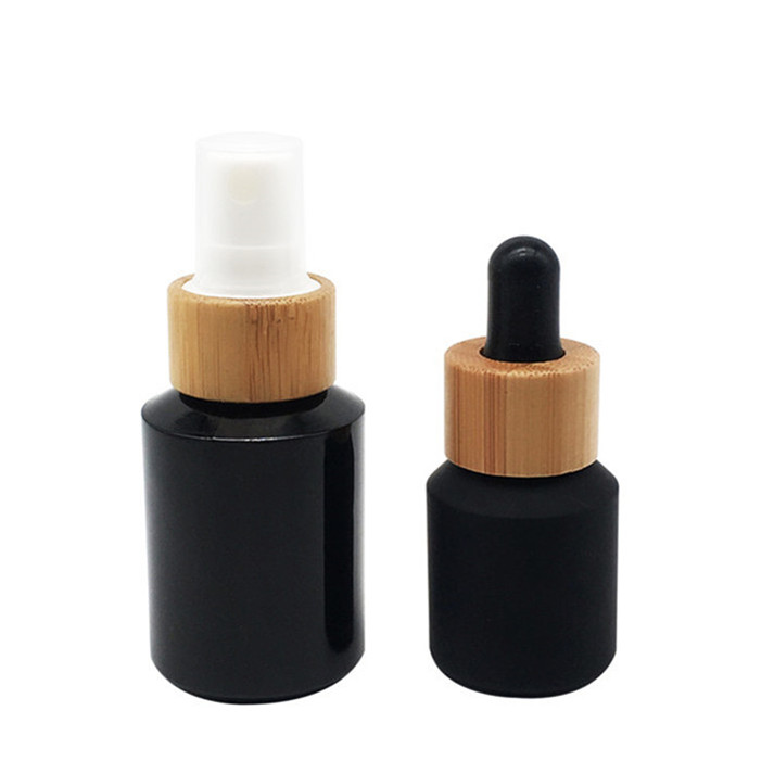 glass cosmetic jar and bottles with bamboo lid packaging