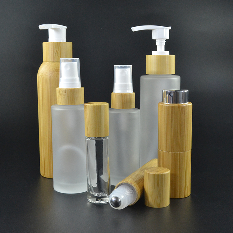 glass cosmetic packaging bottle 30ml 50ml 100ml 120ml 150ml frosted glass bottle with bamboo lotion pump lid