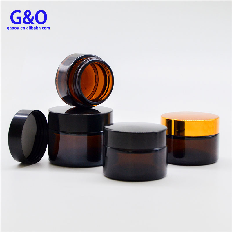 glass jar cosmetic packaging 15g 15ml 30g 30ml glass cosmetic packaging jar 60ml 2oz amber cream jar with black metal cap