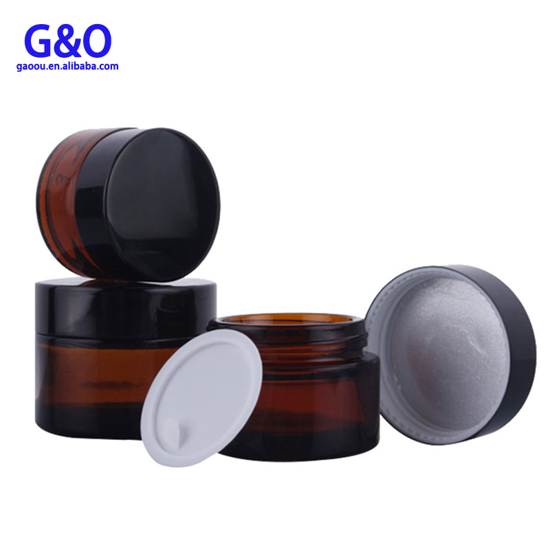 glass jar cosmetic packaging 15g 15ml 30g 30ml glass cosmetic packaging jar 60ml 2oz amber cream jar with black metal cap
