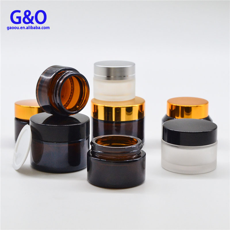 glass jar cosmetic packaging 15g 15ml 30g 30ml glass cosmetic packaging jar 60ml 2oz amber cream jar with black metal cap