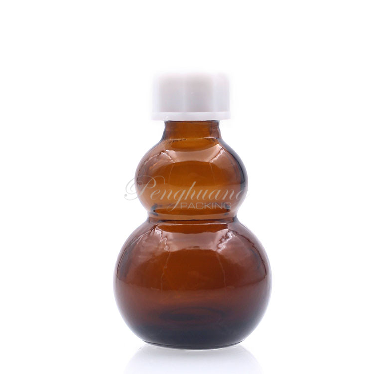 gourd shape glass essential oil bottles hot selling/pretty shape cosmetic packing fo oil