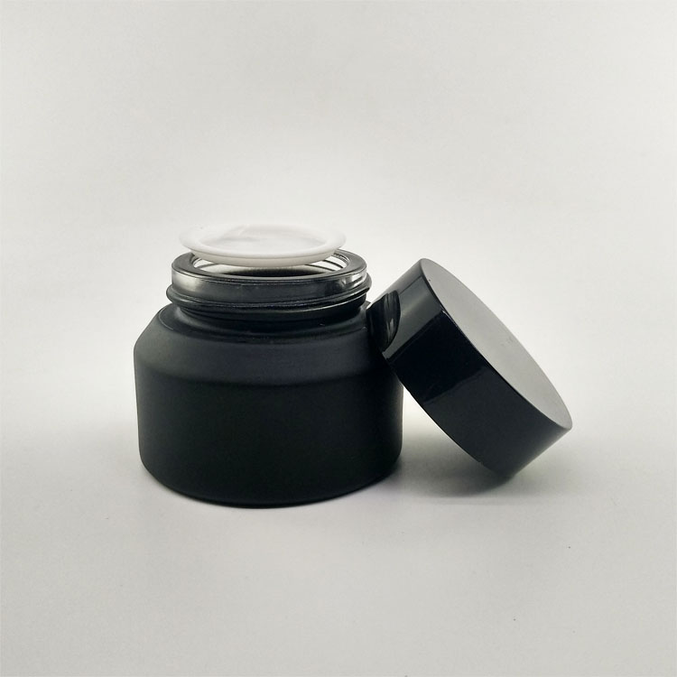 guangzhou wholesale 30ml 30g matte black glass jar with black lid for serum lotion cream packaging