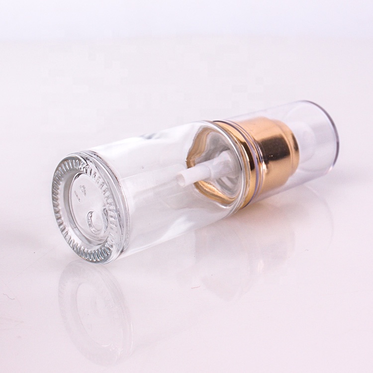 high end cosmetic packing 1oz clear glass lotion bottle with gold metal lotion pump