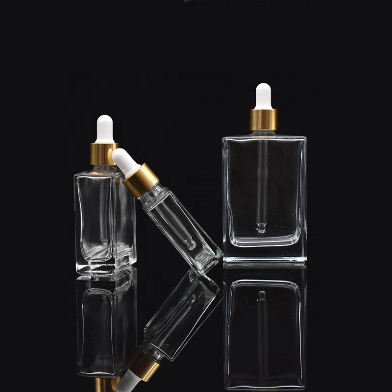 high-end square clear glass dropper bottles 30ml 50ml 100ml rectangle glass dropper bottles with gold cap for essential oil