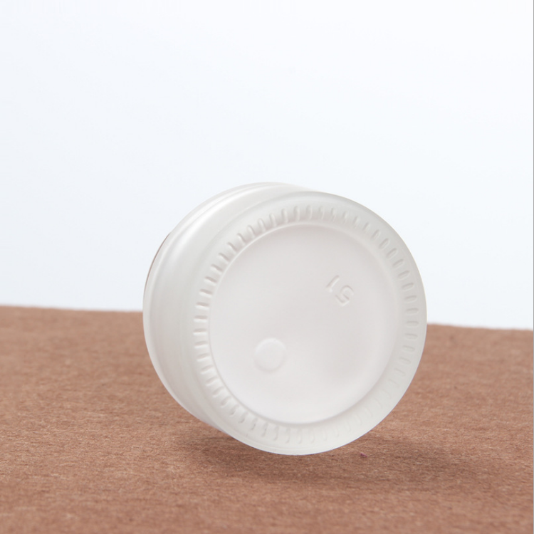 high quality 30 ml 1oz clear frosted cosmetic packaging glass jar with white black plastic cap for skin care cream