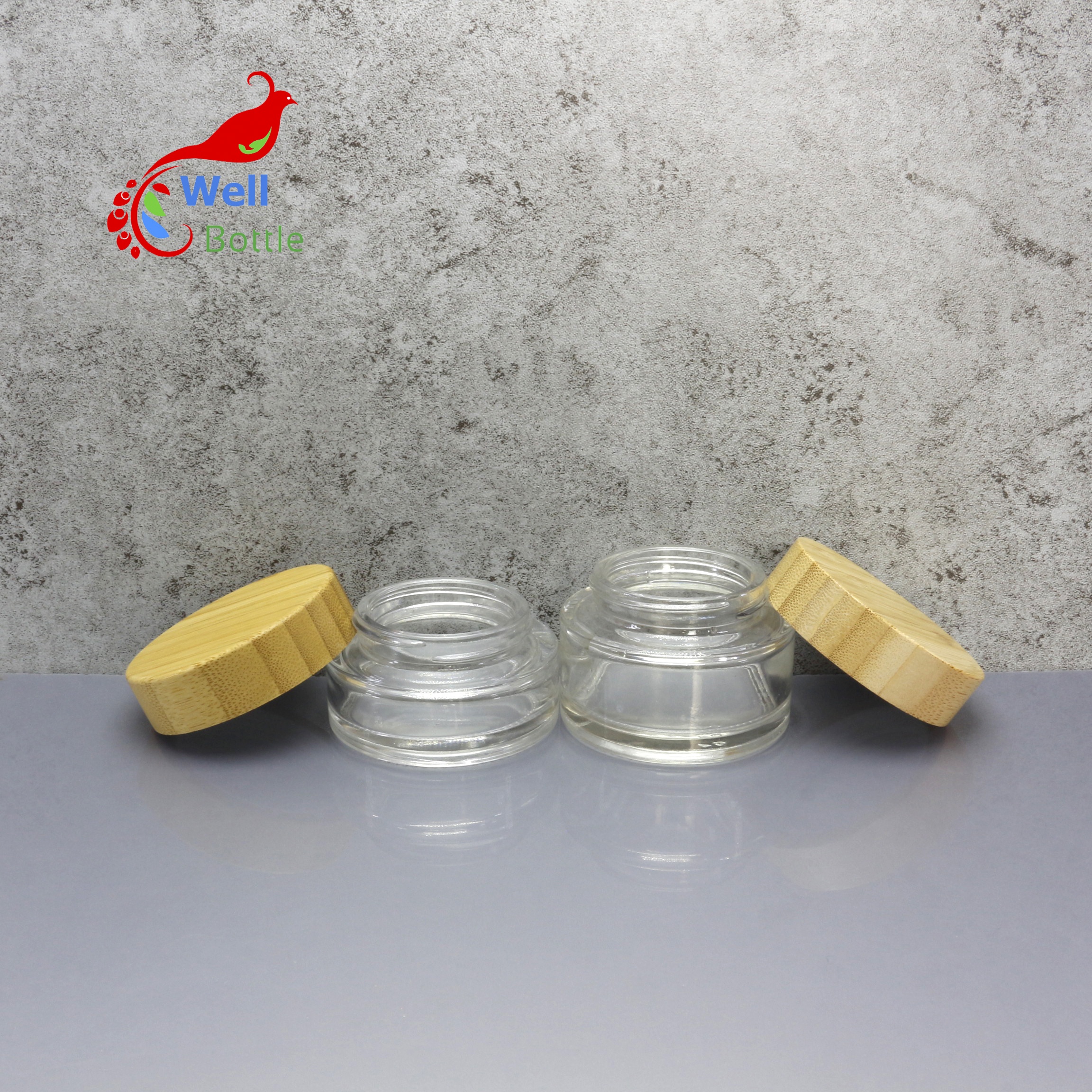 high quality 30g 50g clear frosted green blue glass cosmetic jar with bamboo lid BJ-610C