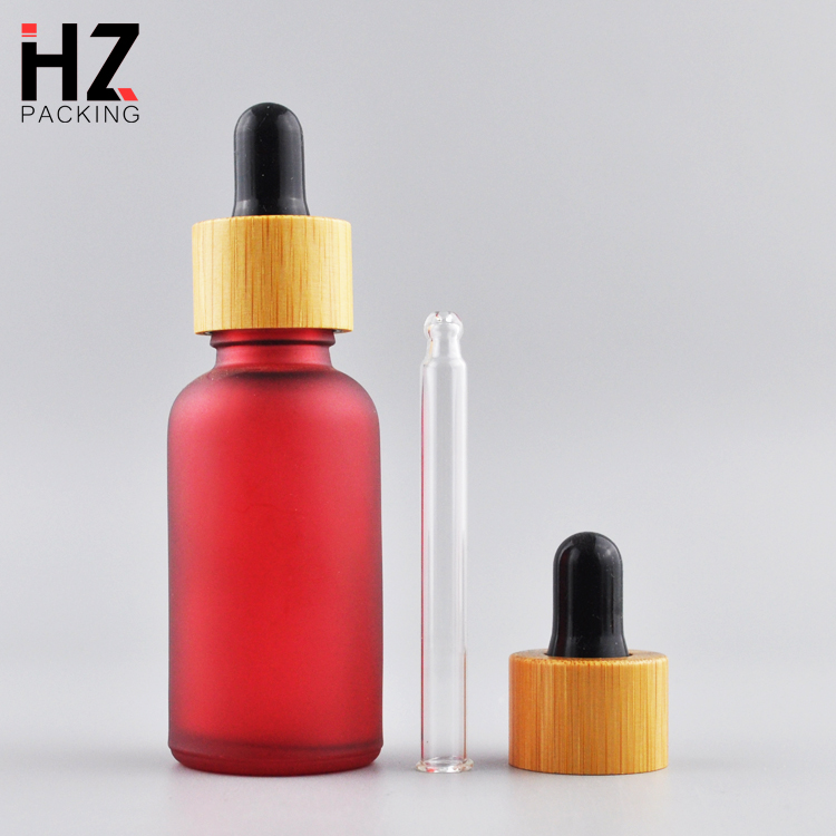 high quality 30ml 50ml round black amber round frosted cosmetic essential oil bottle with bamboo lid