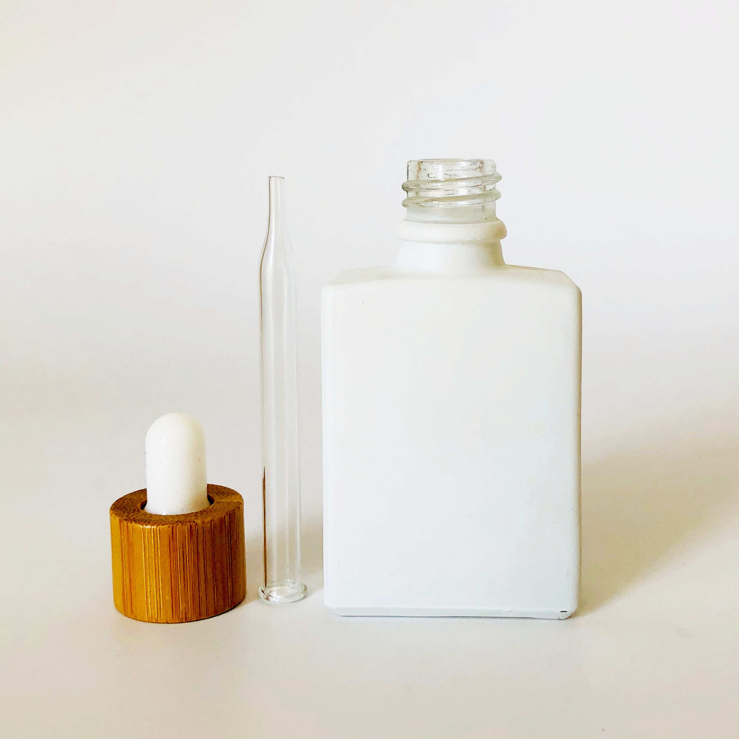 high quality 30ml glass bamboo bottle rectangle 30ml frosted white glass dropper perfume bottle