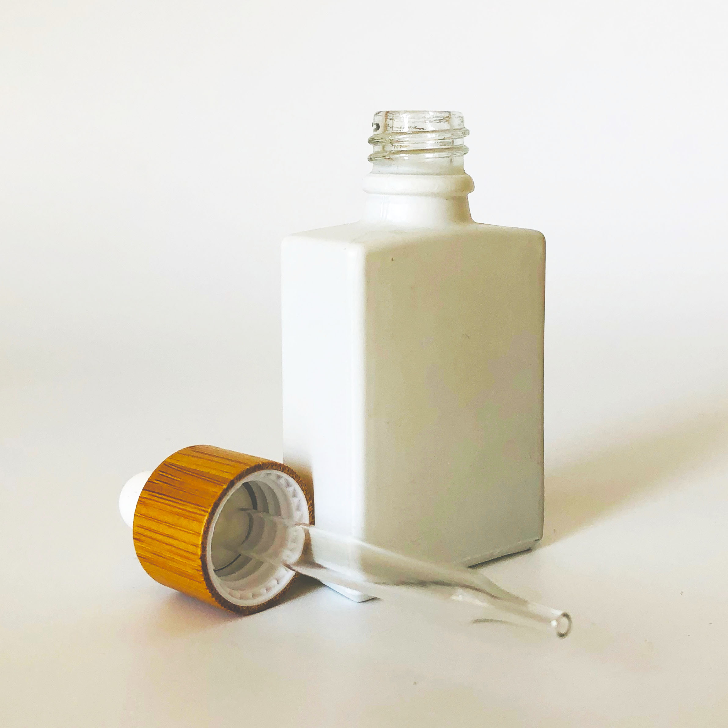 high quality 30ml glass bamboo bottle rectangle 30ml frosted white glass dropper perfume bottle