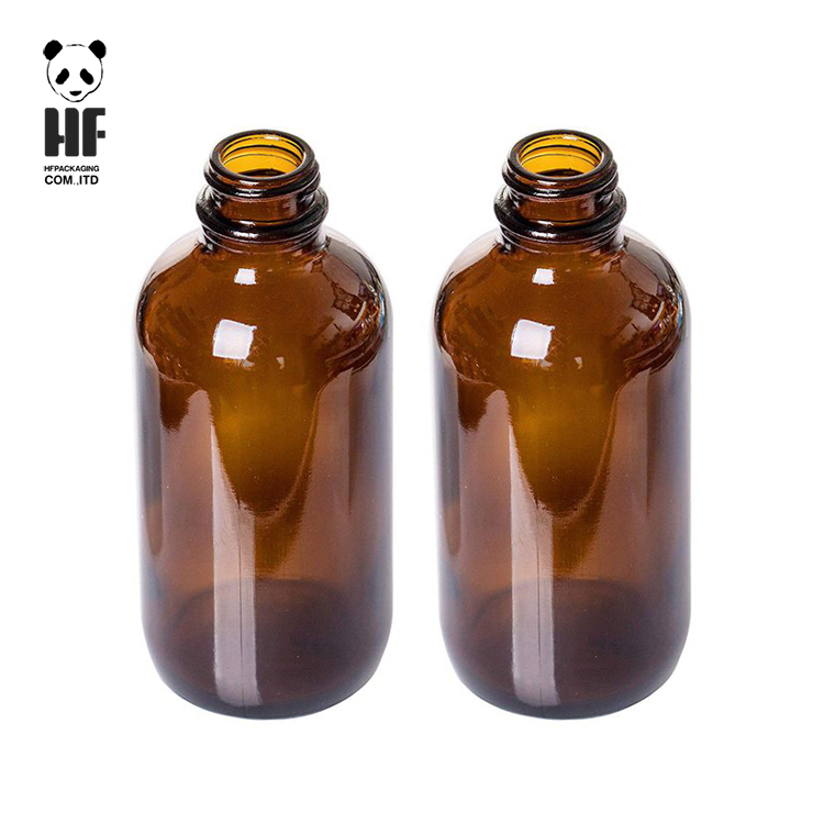 high quality 4oz boston round amber glass bottle container with black plastic cap