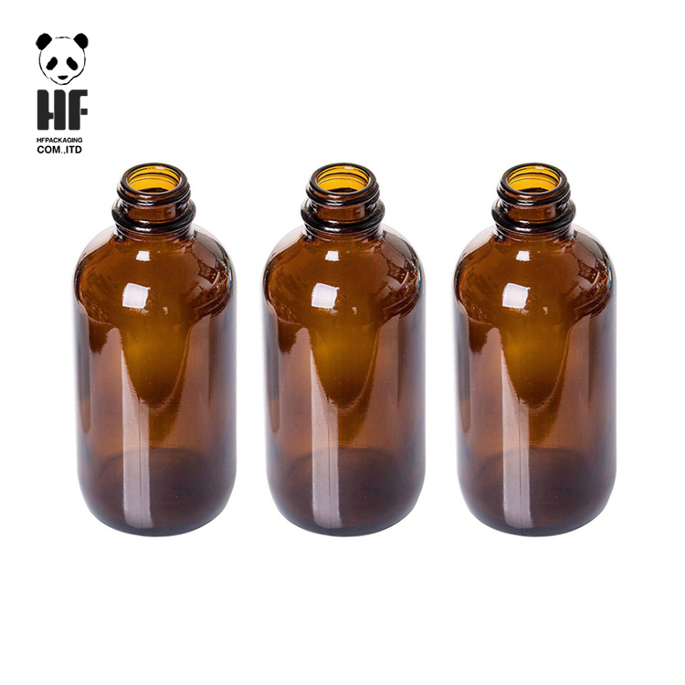 high quality 4oz boston round amber glass bottle container with black plastic cap