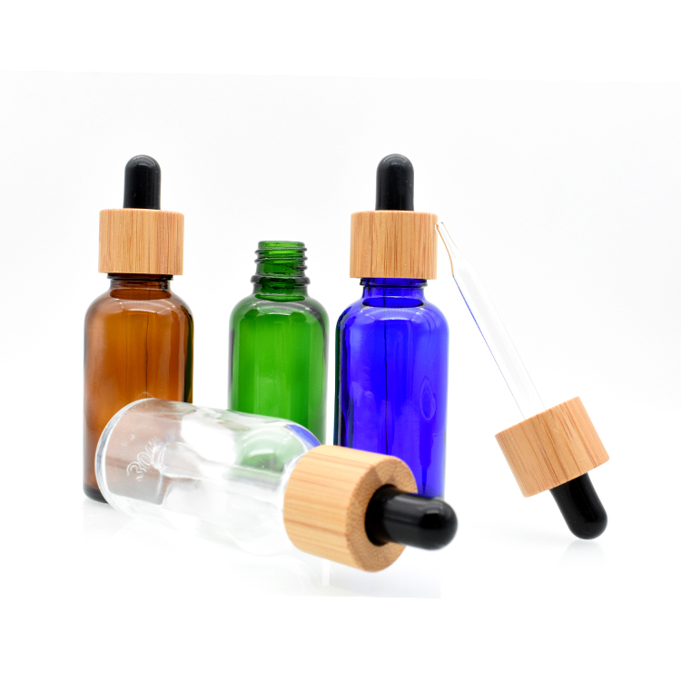 high quality cosmetic essential oil 5ml 10ml 15ml 20ml 30ml 50ml 100ml amber clear glass tincture bottle with bamboo dropper