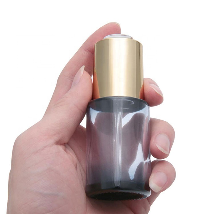 high quality creative cosmetic package clear painting serum glass bottle 30ml with clear autoroation press pump