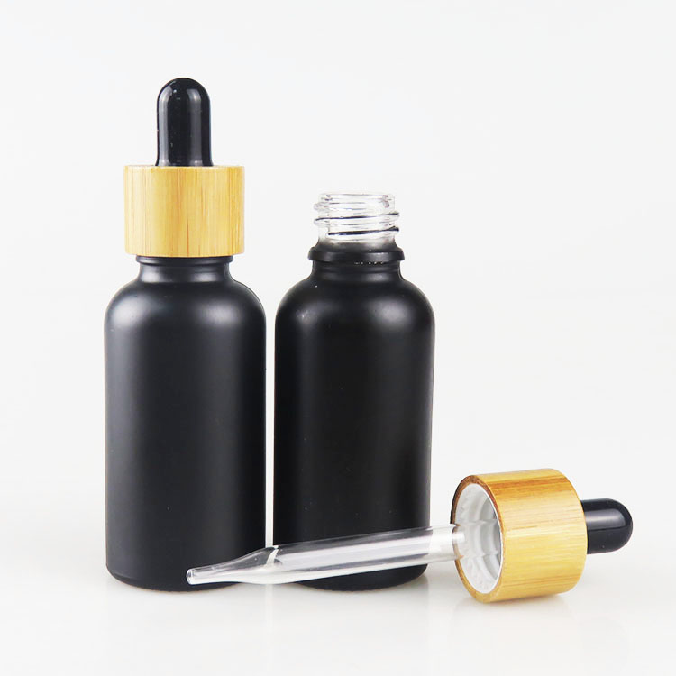 high quality glass material essential oil use 30ml frosted black glass dropper bottle bamboo cap