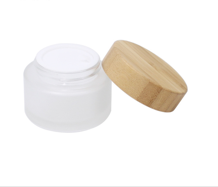 high temperature handling 1oz nature glass jar cosmetic, empty clear bamboo lid glass jar for cream