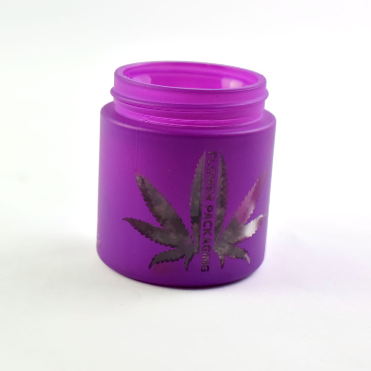 hollow-carved logo pink glass jar with child resistant cap made in China