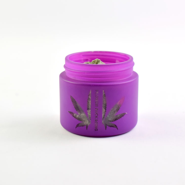 hollow-carved logo pink glass jar with child resistant cap made in China