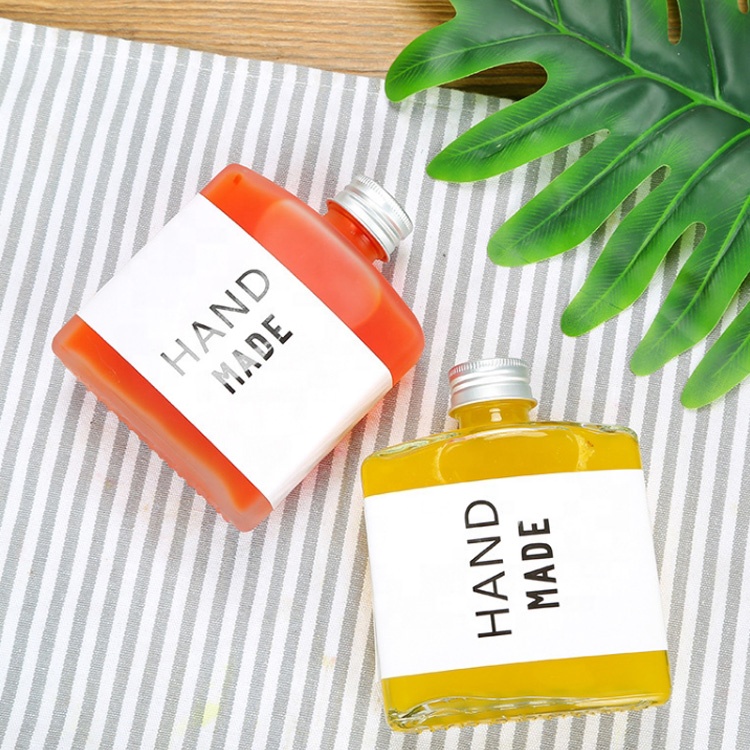 hot refillable drinks packaging 250ml 8oz Reusable Clear glass bottle with cap for milkshakes milk tea cold pressed juice coffee