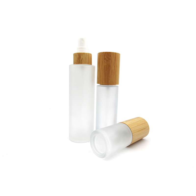 hot sale 100ml 100g flat shoulder cosmetic frosted glass lotion bottle with bamboo pump spray cap cosmetic packaging