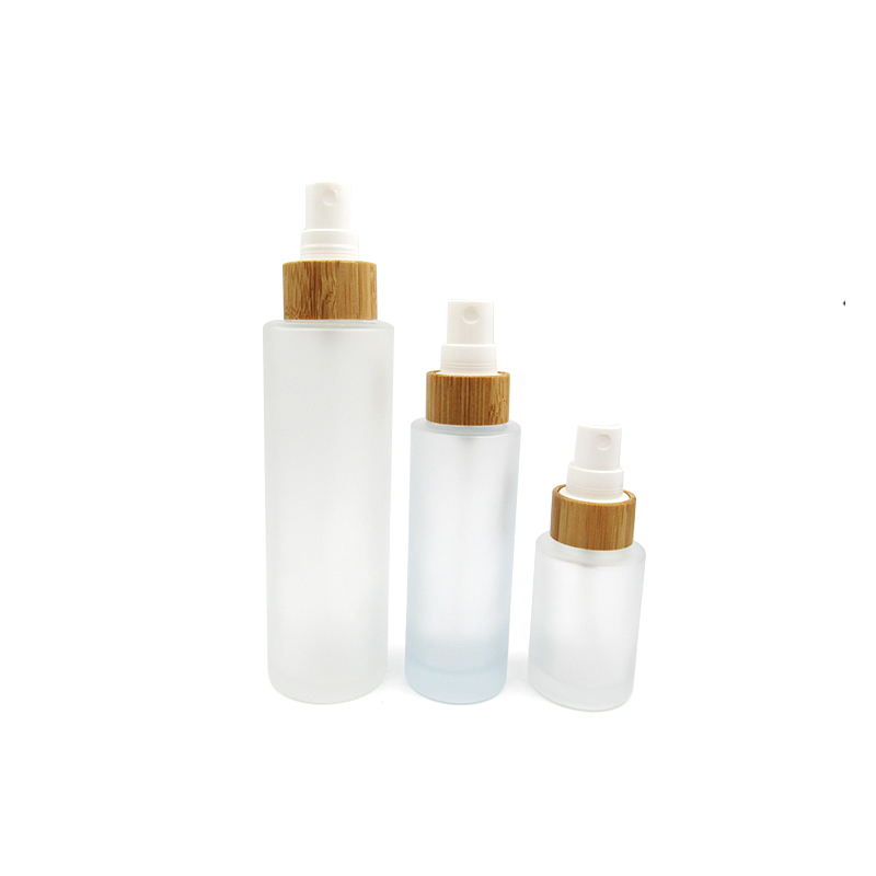 hot sale 100ml 100g flat shoulder cosmetic frosted glass lotion bottle with bamboo pump spray cap cosmetic packaging