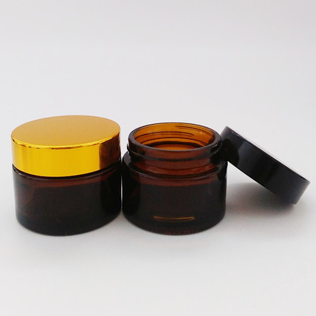 hot sale 10g 30g 1oz cosmetic packaging amber glass jar with gold/silver/black lid