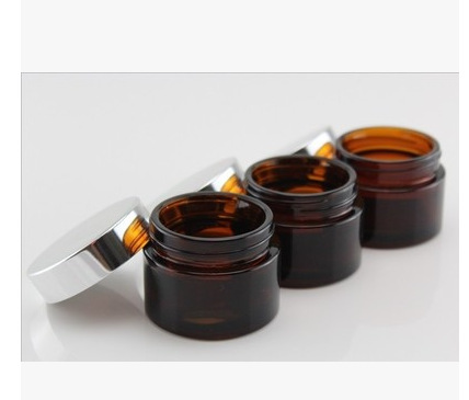hot sale 10g 30g 1oz cosmetic packaging amber glass jar with gold/silver/black lid
