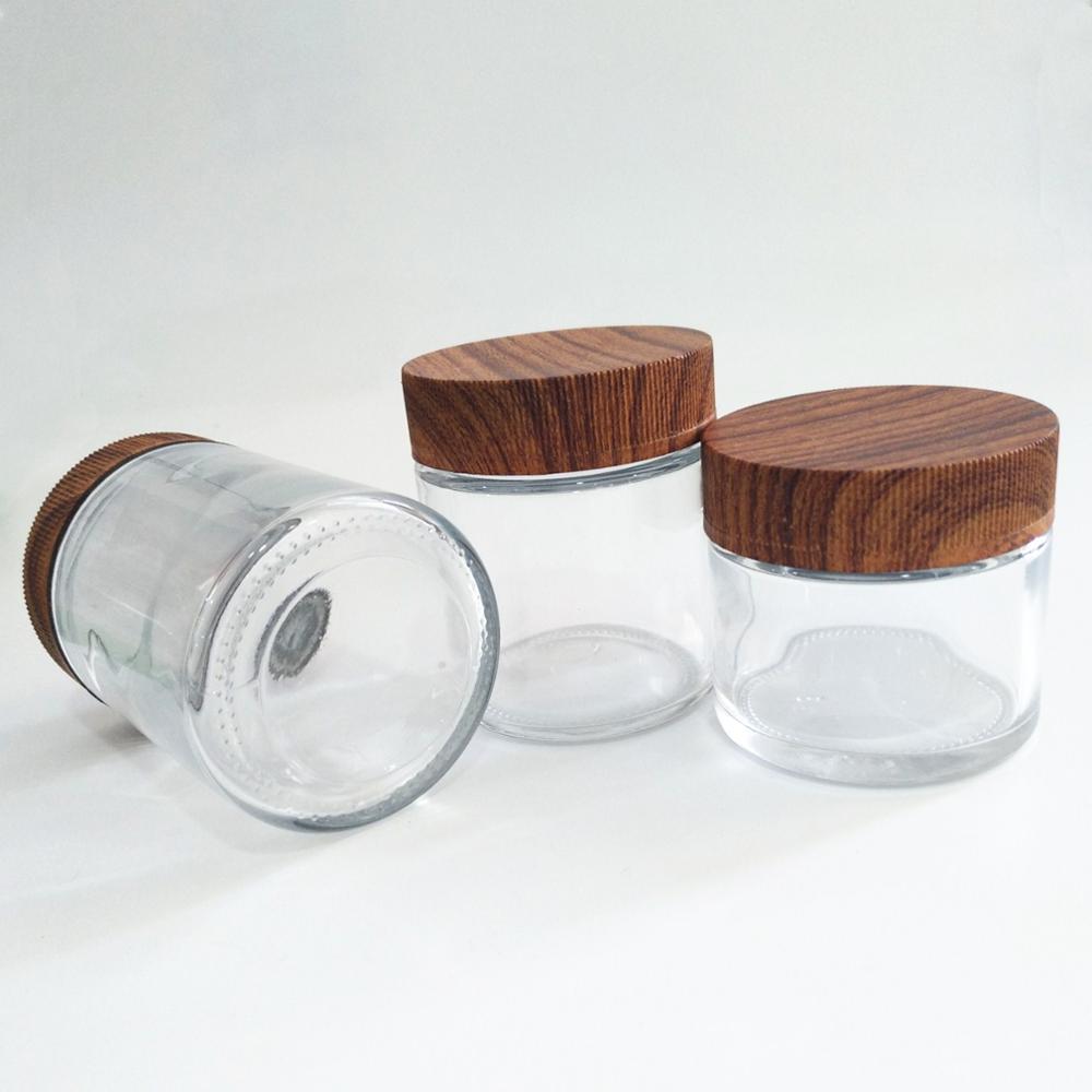 hot sale 2oz air tight glass jar child resistant lid 3oz child proof cap glass packaging 4oz qingdao xinte glass jars cosmetic