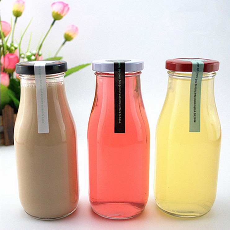 hot sale 500ml custom clear milk glass bottles with colored cap