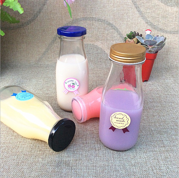 hot sale 500ml custom clear milk glass bottles with colored cap