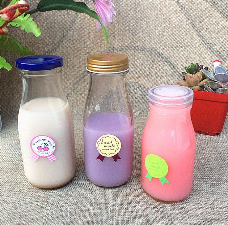 hot sale 500ml custom clear milk glass bottles with colored cap