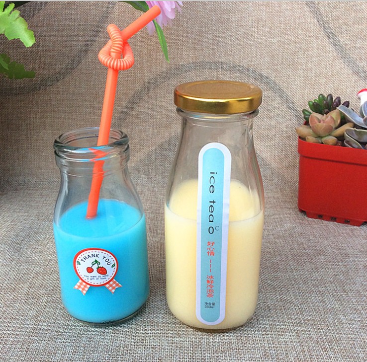 hot sale 500ml custom clear milk glass bottles with colored cap