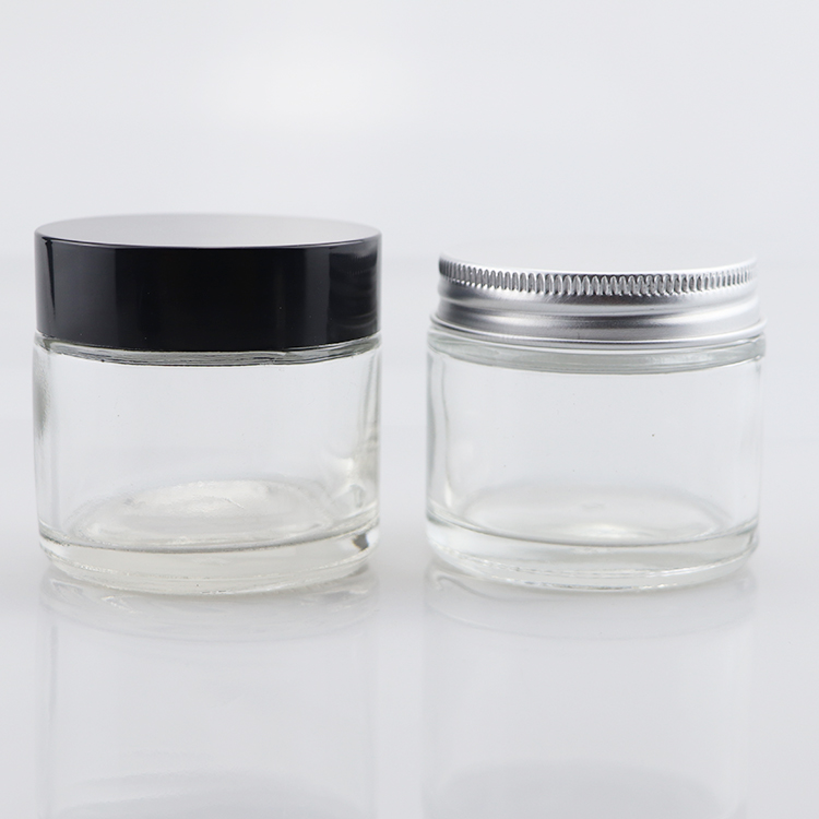 hot sale Cosmetic cream jars 5g 10g 15g 20g 30g 50g 100g 1oz 2oz amber clear glass jar with gold silver black cap