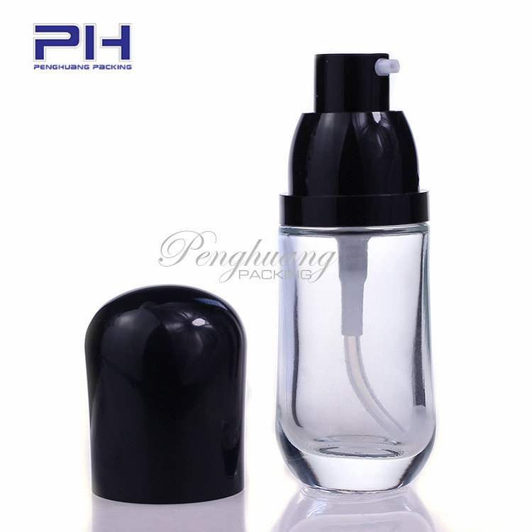 hot sale empty pill shape 30ml makeup liquid foundation glass bottle with black pump and cap