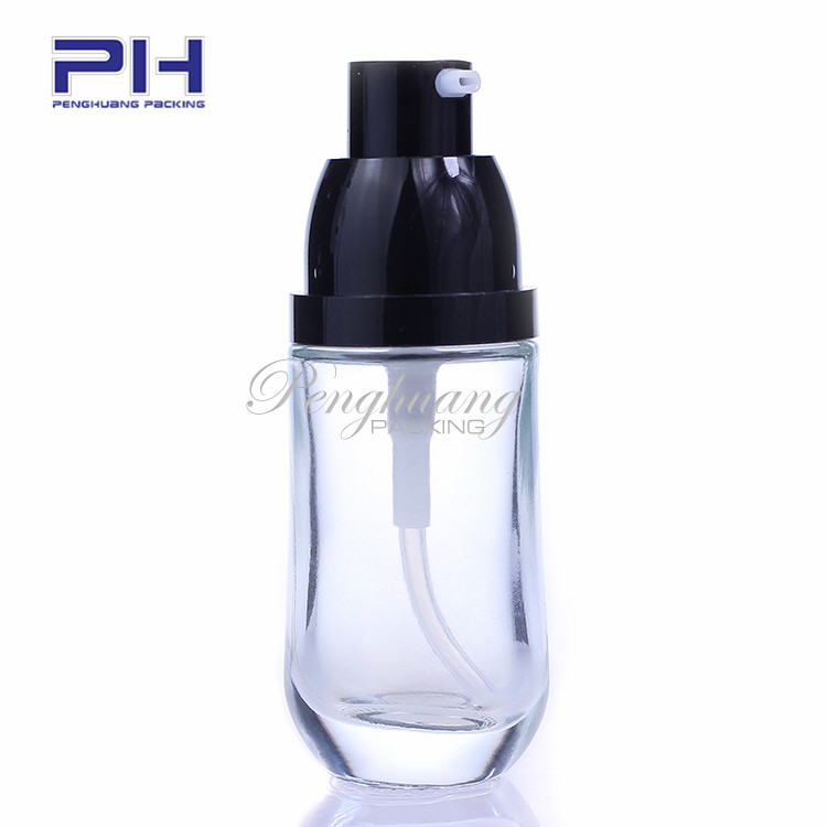 hot sale empty pill shape 30ml makeup liquid foundation glass bottle with black pump and cap
