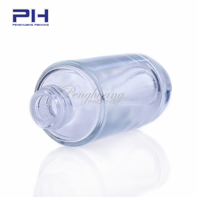 hot sale empty pill shape 30ml makeup liquid foundation glass bottle with black pump and cap