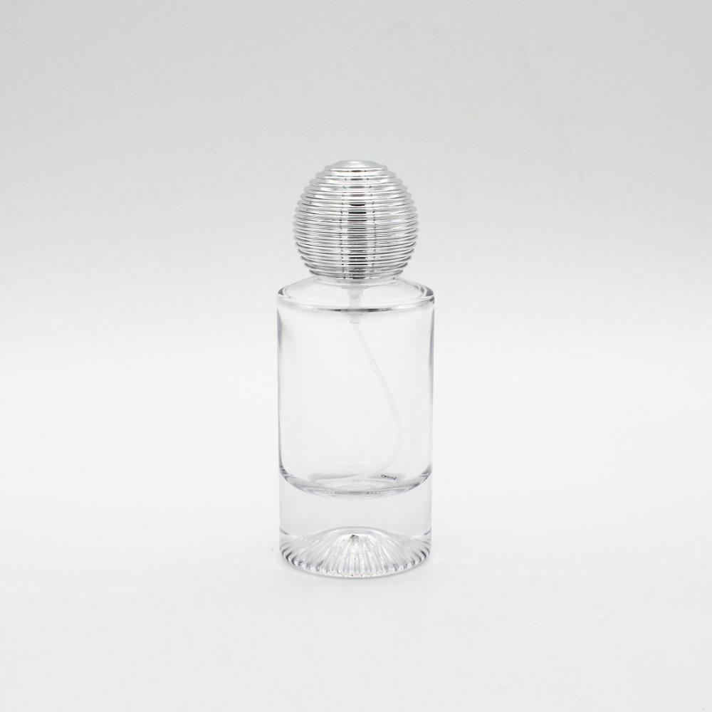 hot sale fancy think bottom cylinder round empty 50ml perfume glass bottle