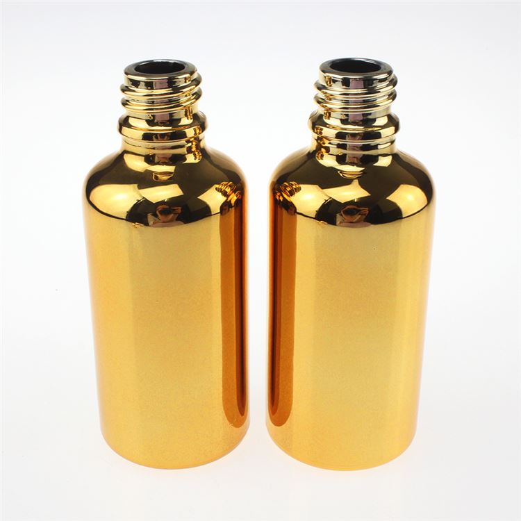 hot sale gold 50ml essential oil glass bottle with gold cap, high-grade 50 ml glass essential oil bottles suppliers
