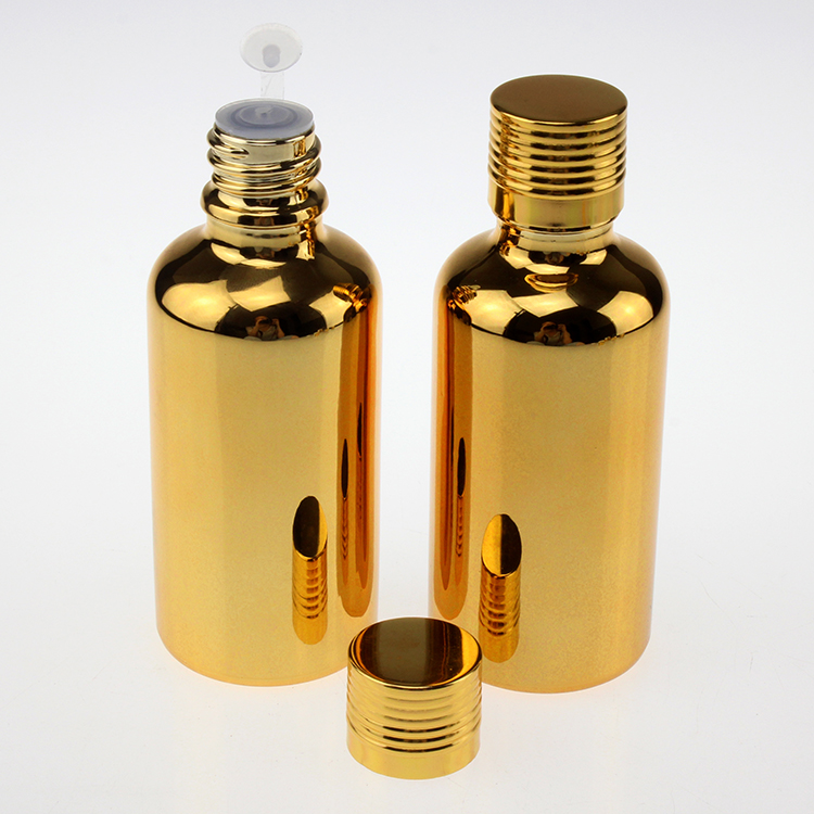 hot sale gold 50ml essential oil glass bottle with gold cap, high-grade 50 ml glass essential oil bottles suppliers