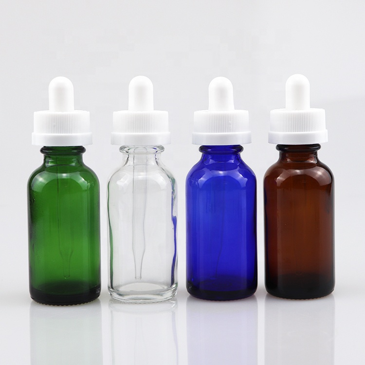 hot sale portable glass essential oil boston round bottle blue empty bottle with dropper 1oz 2oz 4oz