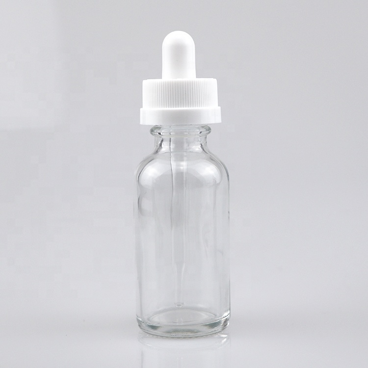 hot sale portable glass essential oil boston round bottle blue empty bottle with dropper 1oz 2oz 4oz