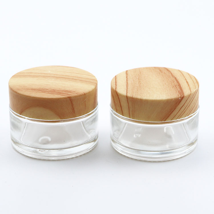hot sale whole sets clear frosted glass cream jar with bamboo grain lid glass bottle for lotion cosmetic packaging