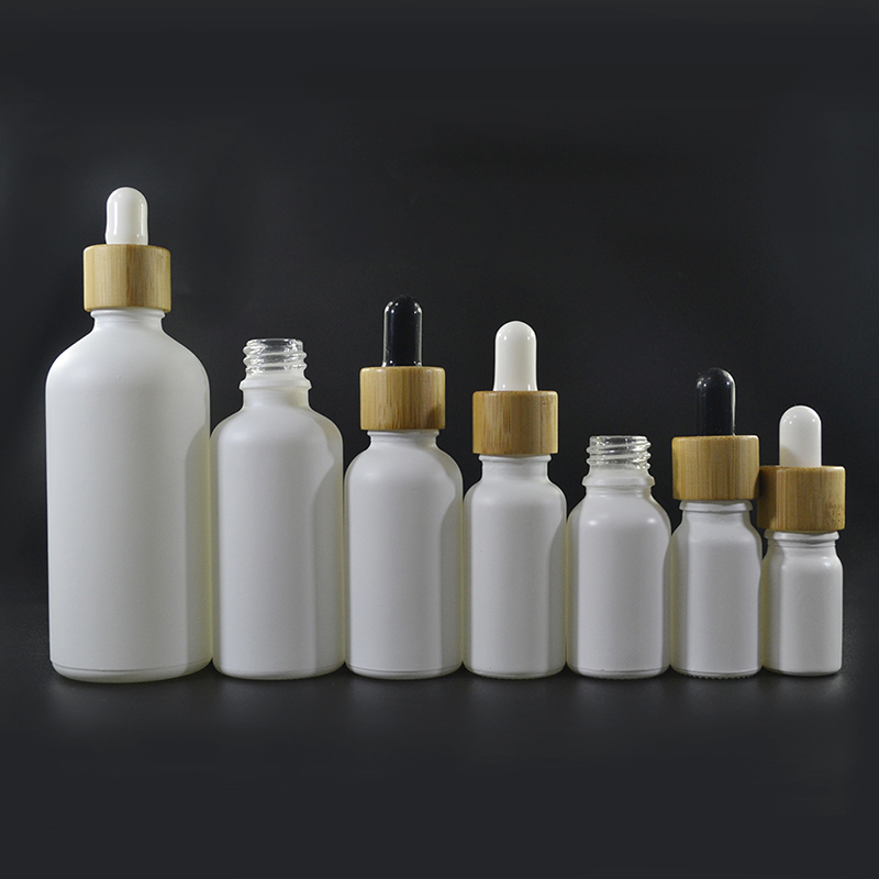 hot sales 5ml 10ml 20ml 30 ml 50ml 100ml matte frosted white black glass essential oil dropper bottle with bamboo lid